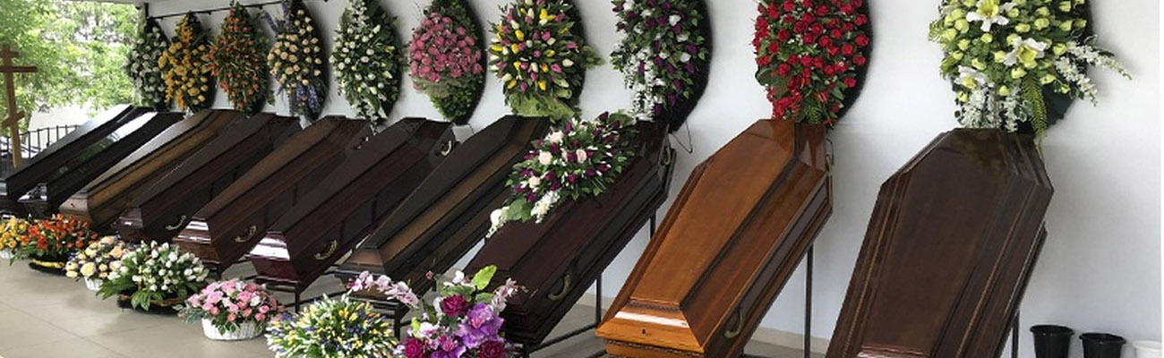 Траурная флористика композиции для похорон и прощания